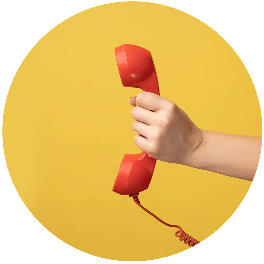 hand holding a red phone