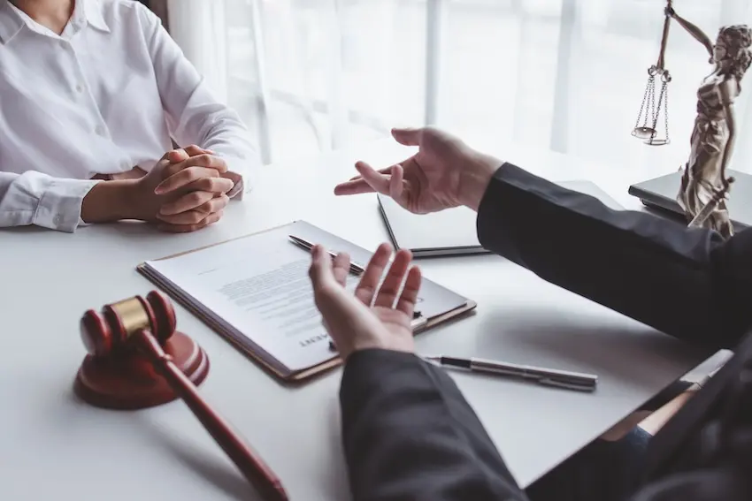 Car accident doctor and personal injury attorney coordinating treatment and legal strategy for accident victim